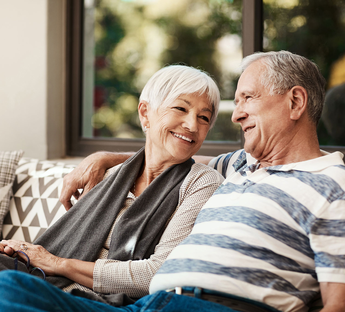 retired homeowners sitting outside