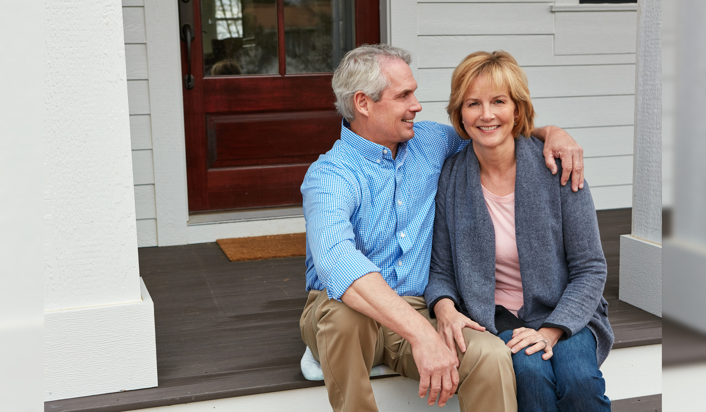 House, outdoor and hug with senior couple with love, real estate and happiness with relationship, marriage and retirement. Home, front yard or old man with mature woman, embrace and bonding together.